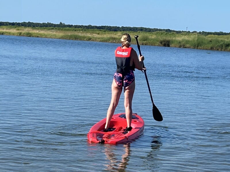 Fan faisant du paddle