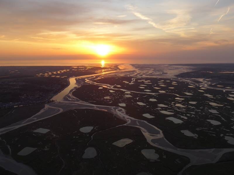 Coucher de soleil sur les méandres de la baie de Somme.